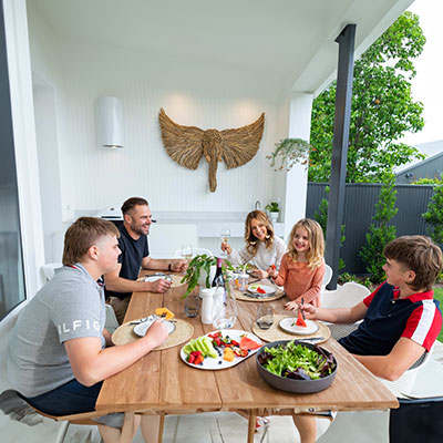 Family having quality time in their outdoor dining area