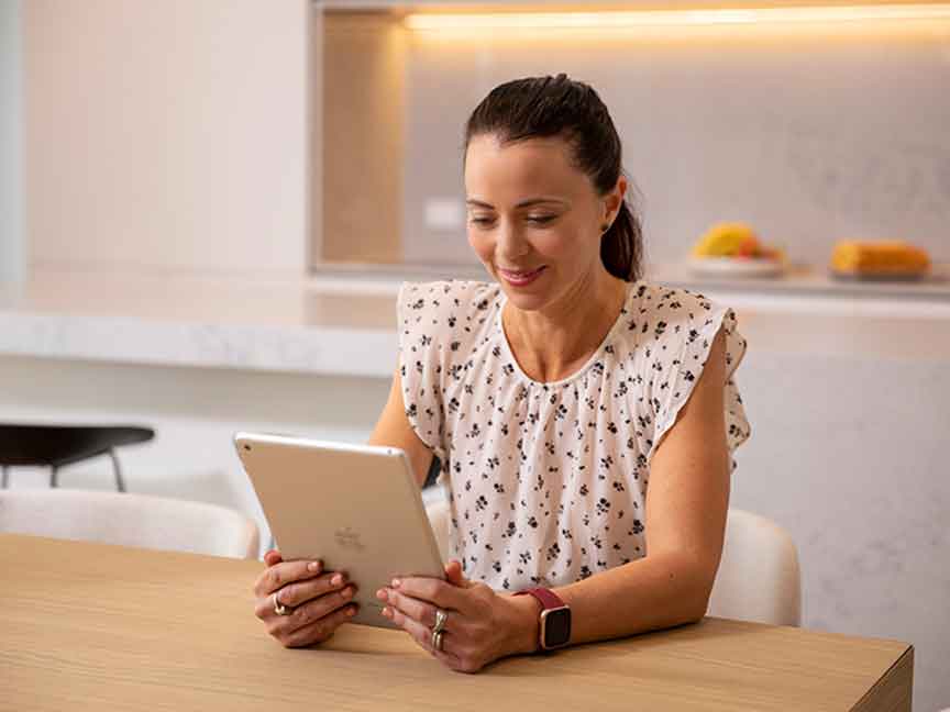 A woman using an iPad