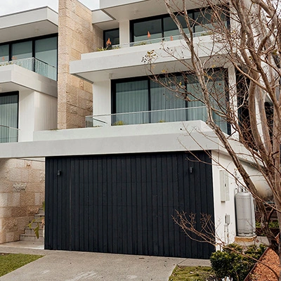 Sleek modern residence with front garage