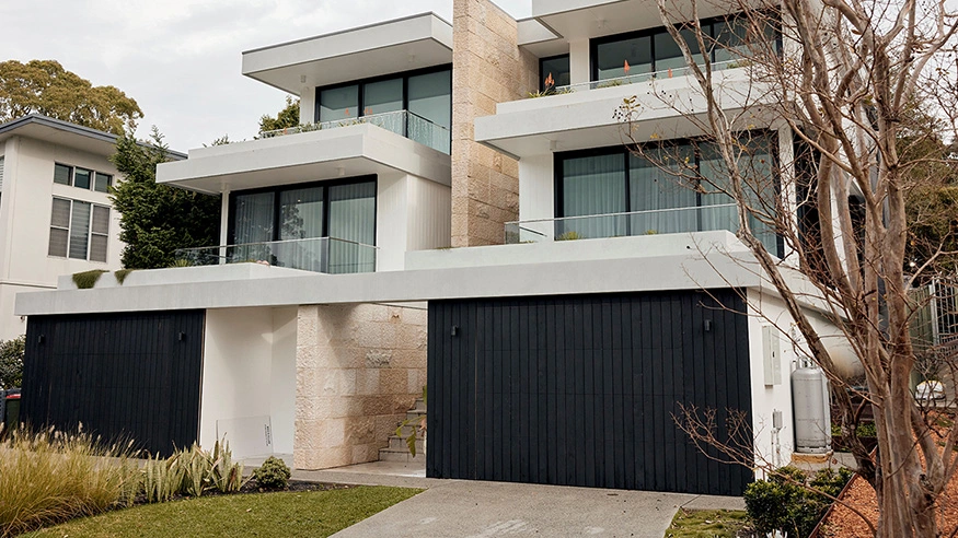 Sleek modern residence with front garage