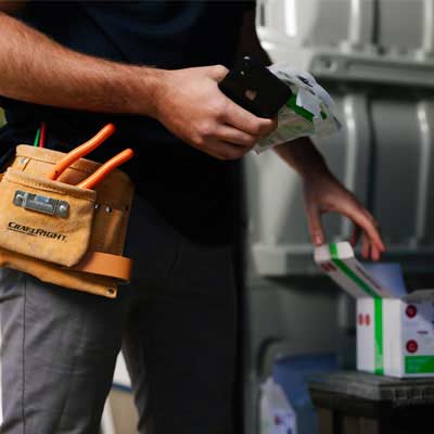 electrician holding Clipsal products