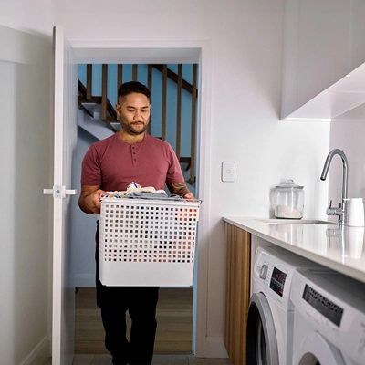 Man holding a laundry basket