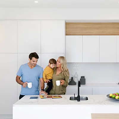 A family in a kitchen.