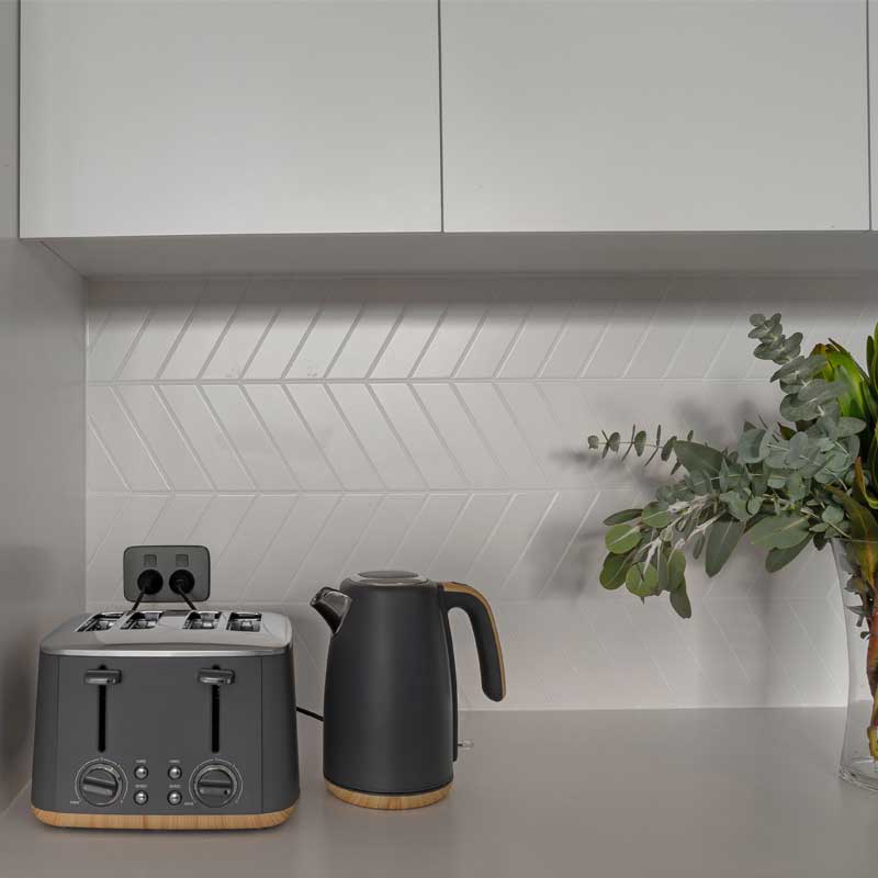 Clipsal Iconic Essence Anthracite in stylish kitchen