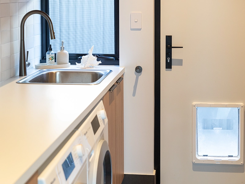 A washer and dryer in a small kitchen