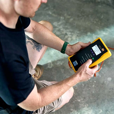 Electrician holding a Sparkemate tester