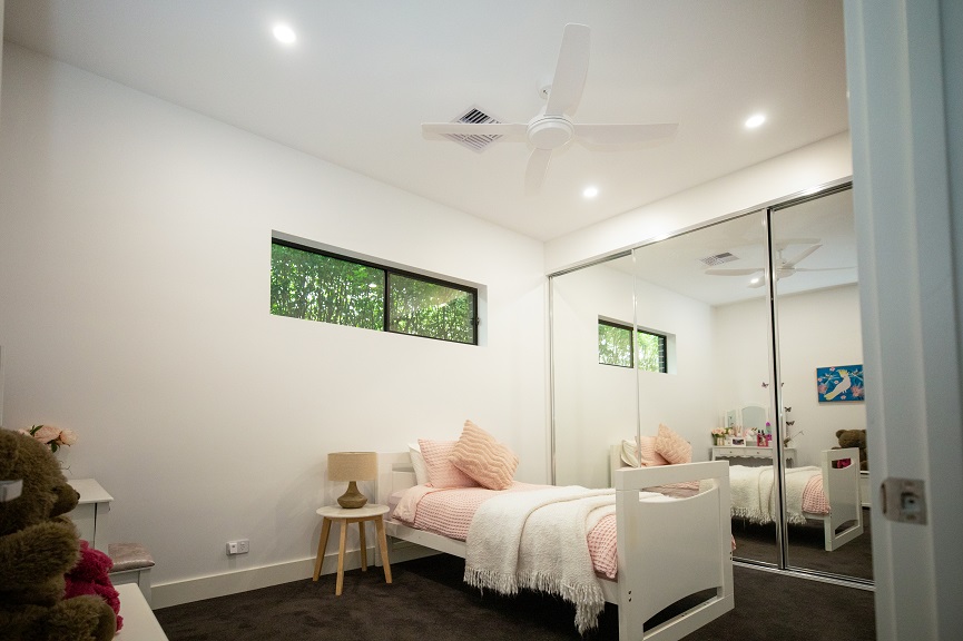 LED downlights illuminating a child's bedroom