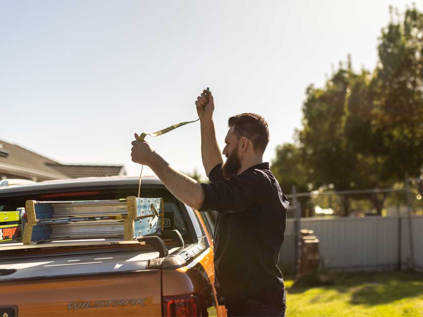 electrician tying ladder